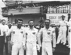 23.jpg: Экипаж космического корабля «Аполло-7» — астронавты У.Ширра, Д.Эйсел и Р.У.Каннинхэм на палубе «Эссекса» после благополучного приводнения, 22 октября 1968 г.